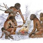 early humans around a fire eating clean fresh food